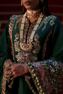 AJR Couture Noorin ASE-19 Meharma Silk Edit 2026 deep green embroidered raw silk unstitched suit, official photo 3