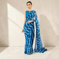 Zarfina blue chiffon saree with digital tie-dye print and matching sleeveless raw silk blouse for formal occasions