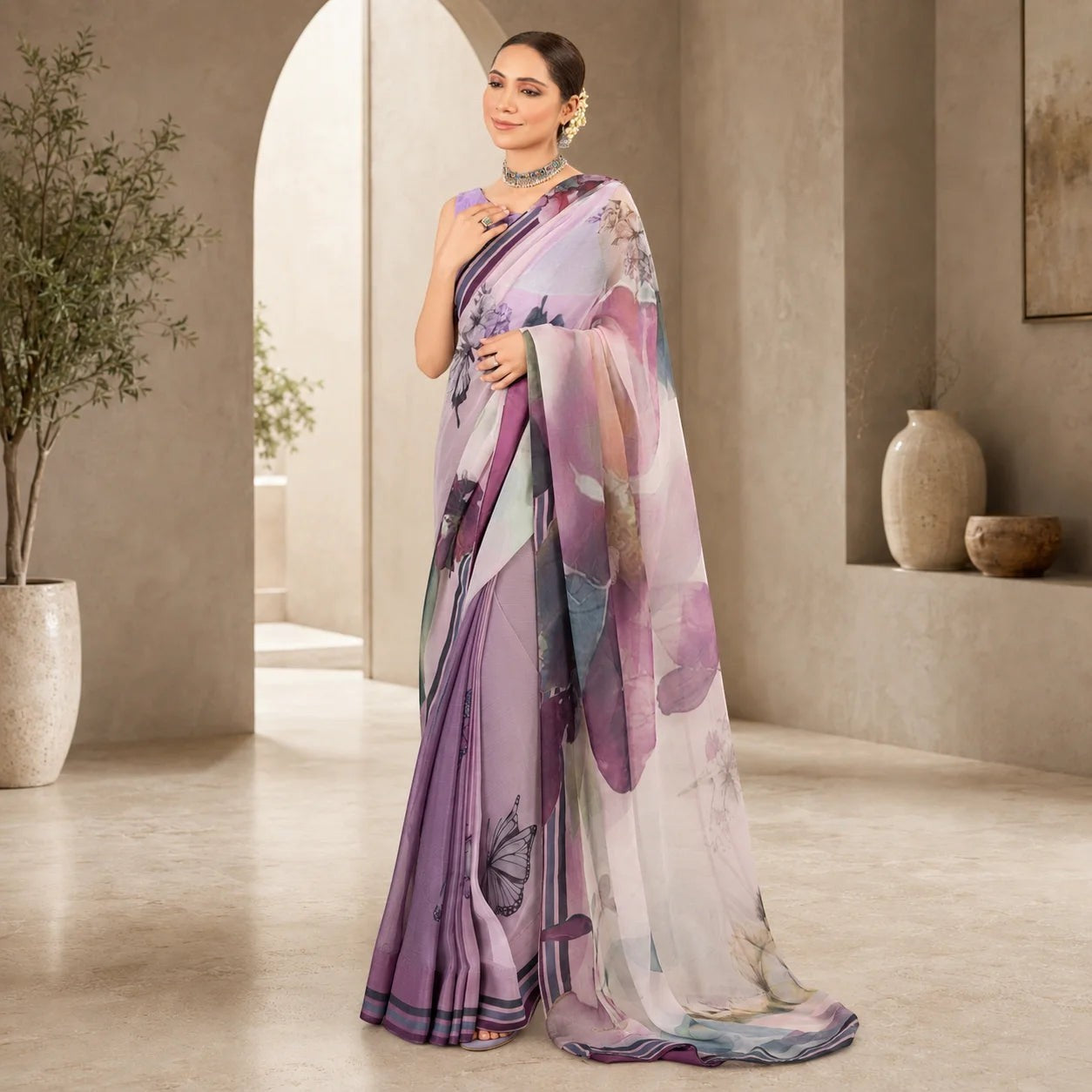 Zarfina digital printed chiffon saree in shades of purple with floral and butterfly motifs worn by a model