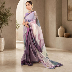 Zarfina digital printed chiffon saree in shades of purple with floral motifs and a matching raw silk blouse.